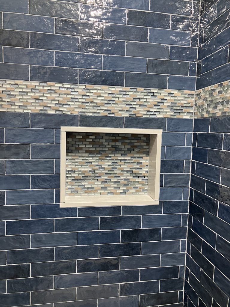 Shower niche in glass tile